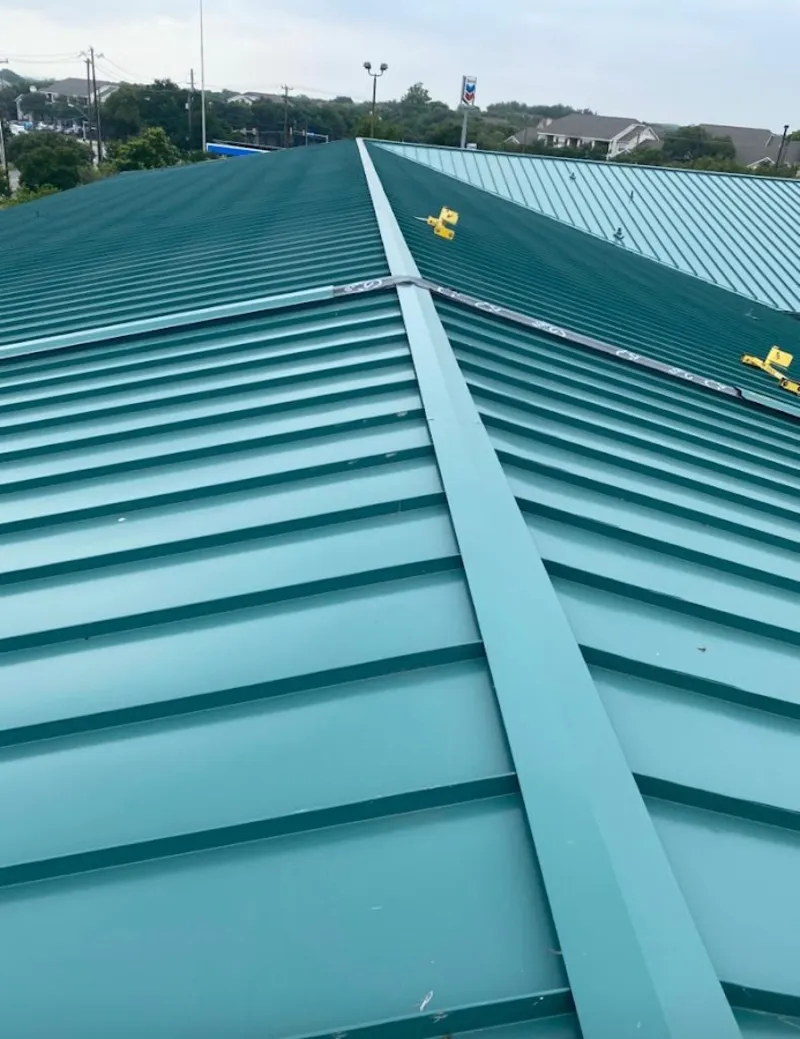 Green commercial metal roof ridge and valley for Metal Roof Repair in The Pinery